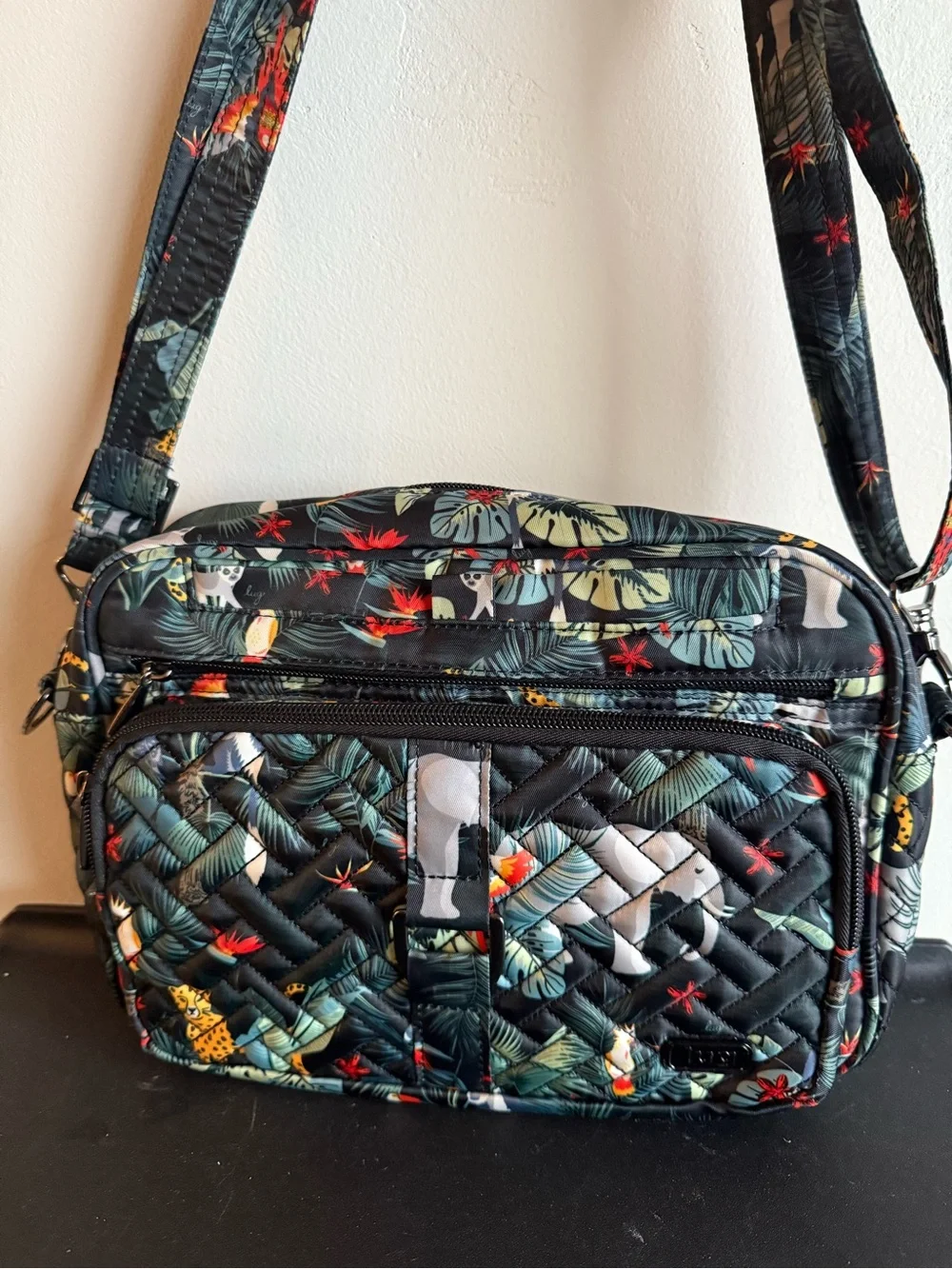 lug Quilted Crossbody Bag in Black with Green and Red Tropical Print